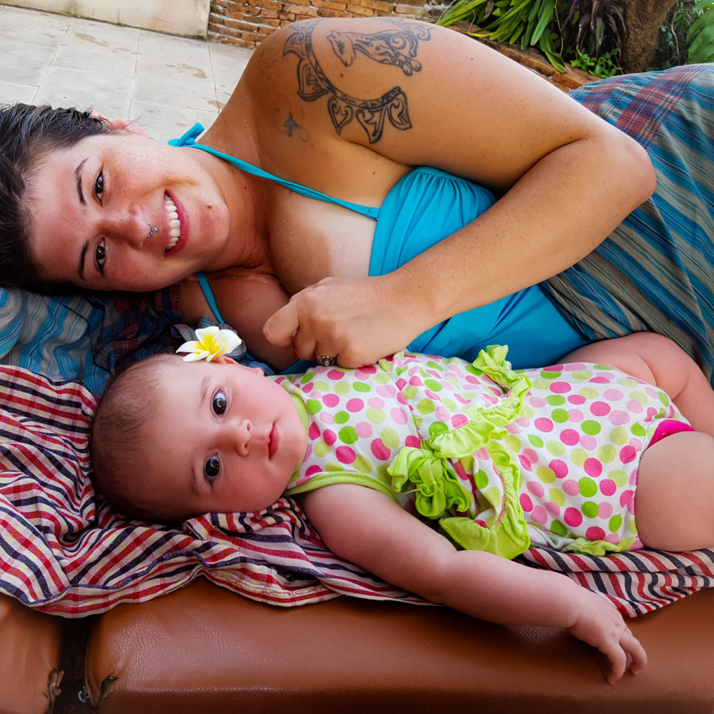 mother and baby ready to breastfeed while traveling