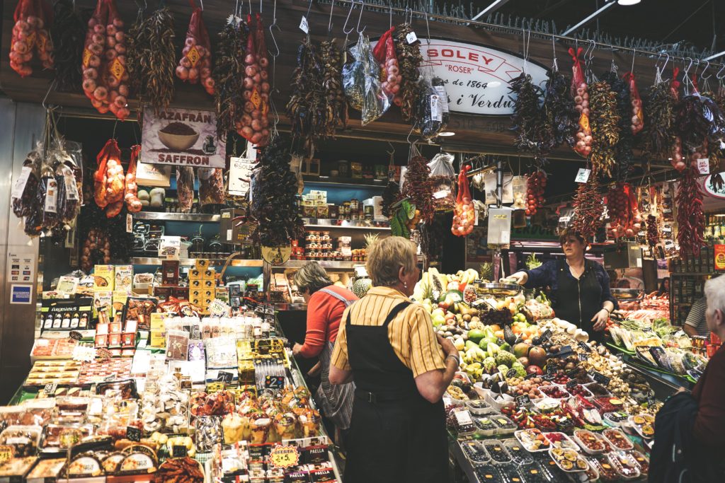 food market in barcelona with toddler