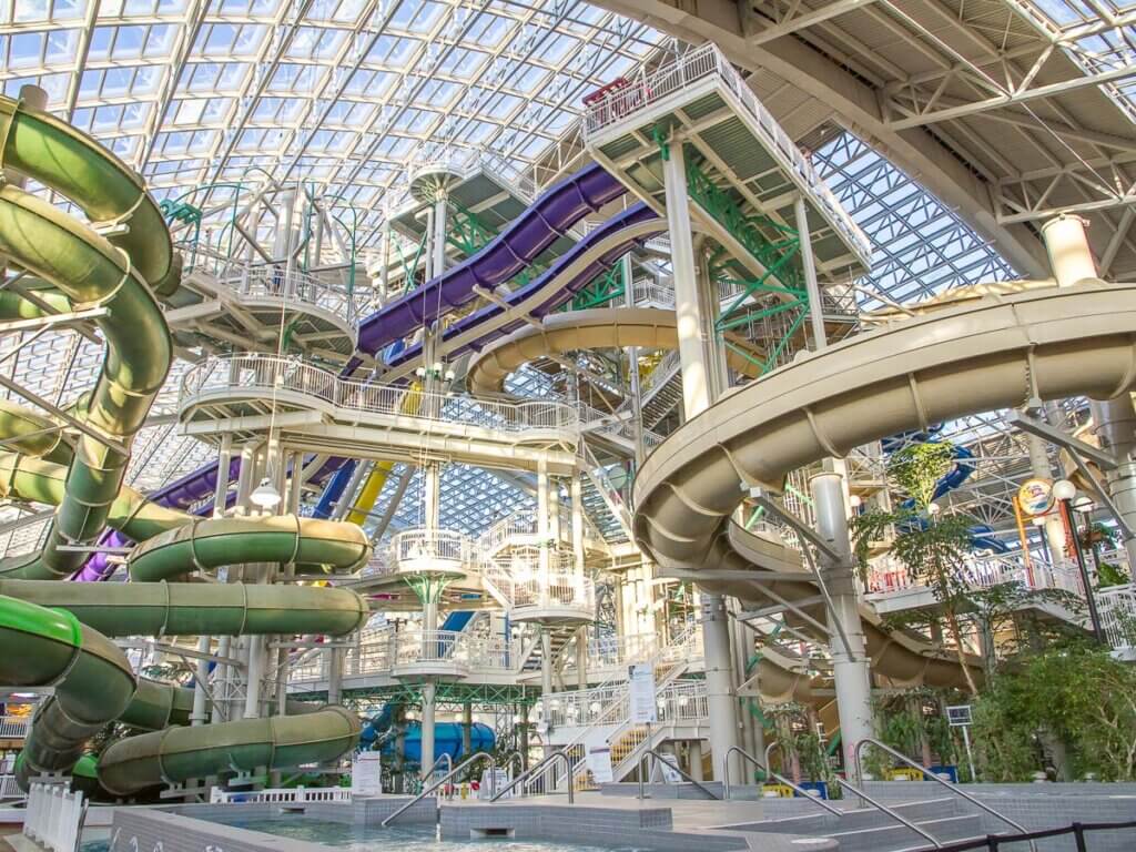 jumble of slides and stairs in a huge looking waterpark